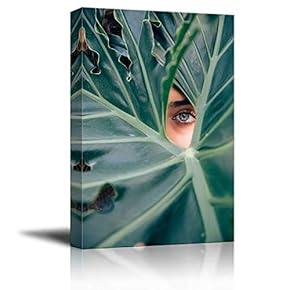 Woman Peeping in Convered by Large Leaves