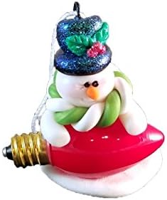 Snowman with his light bulb ornament