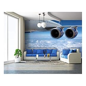 Big Airliner in The Blue Sky with Clouds. - Removable Wall Mural | Self-Adhesive Large Wallpaper - 66x96 inches