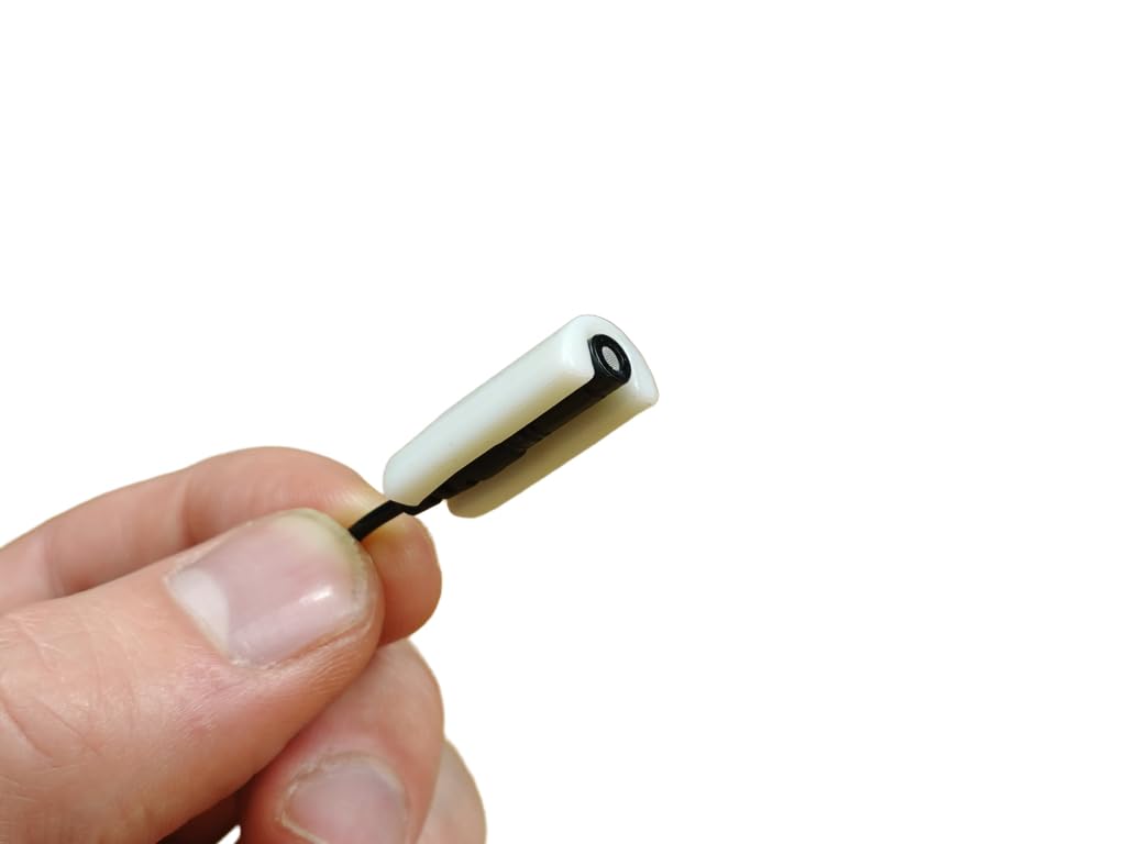 Photo 1 of MiniMount for RODE Lavalier/Lavalier GO. Slim, Low-Profile and Made from Hardened Plastic. Hand-Finished for Smoothness. Includes 5x Hypoallergenic MiniMount Stickies (White)