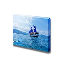Vintage Wooden Ship with Blue Sails Near Komodo Island Indonesia - Canvas Art Wall Art - 12" x 18"