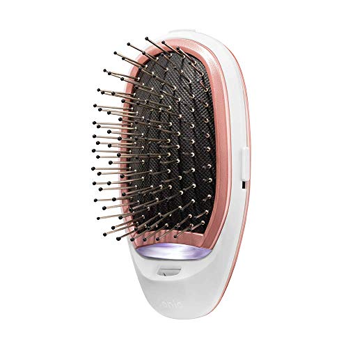 Rose Gold Ionic Brush Rush Brush® Mini Ionic Brush produces negative ions directly to each hair strand which restores the ionic balance. It has a compact size that makes it portable and easy to use anywhere and anytime. It boosts shine, makes your hair smoother, less frizzy. (748323709612)