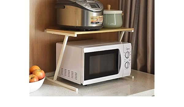 Amazon Com Creative Irregular Punch Free Microwave Oven Rack