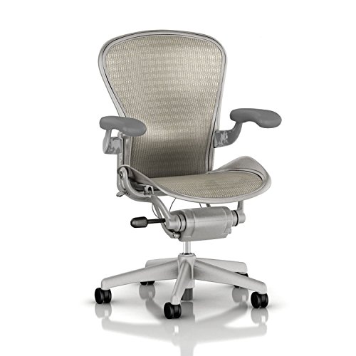Herman Miller Aeron Task Chair: Highly Adjustable w/PostureFit Lumbar Support - Fully Adjustable Vinyl Arms - Tilt Limiter - Size A - Standard Carpet Casters - Titanium Frame/White-Gold Tuxedo Pellicle