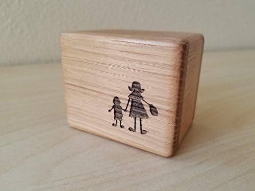 Wooden music block with a mom and son holding hands image engraved to the front, playing the song You are my sunshine