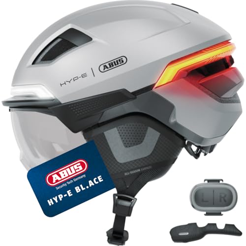 ABUS Fahrradhelm HYP-E BL.ACE - mit Front-, Rück- und Blinklicht sowie kabellos zu aktivierendem Bremslicht - mit Visier (klar) und Ohrenschützern - f