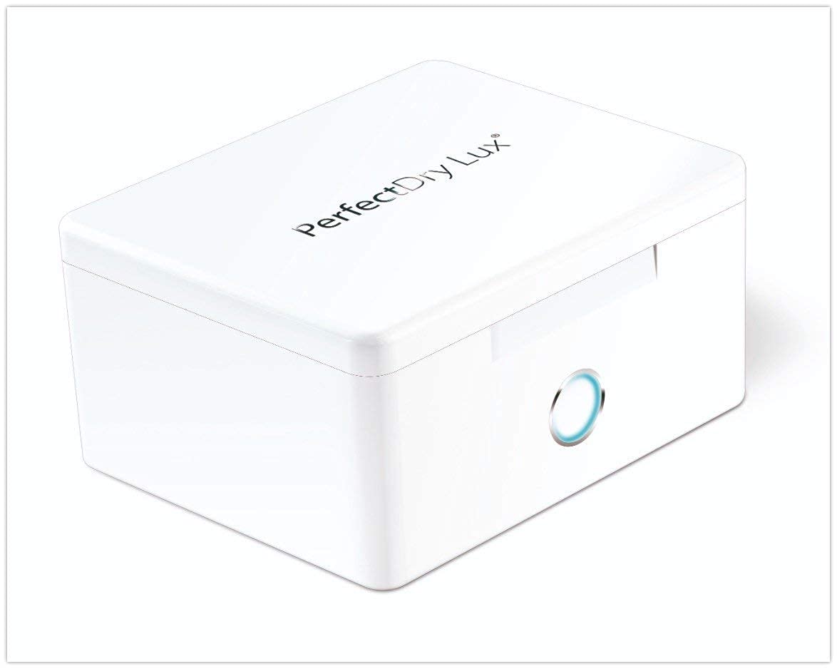 PERFECTDRY LUX DEHUMIDIFIER, UV-C disinfection and drying for hearing device systems. White