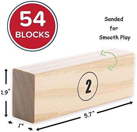 Jenga tower game with blocks and player hand, rules case nearby.