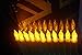 LED-Magic(TM) Set of 12 Flameless Ivory Mini Wax Dipped Flickering Amber LED Battery Timer Taper Candles