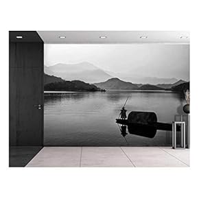 Black and White Canoe with a Man Rowing Down a Lake Towards The Mountains - Wall Mural, Removable Sticker, Home Decor - 66x96 inches