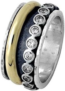 Zircon spinner ring with a gold spinner in a sterling silver wide band