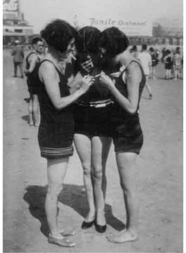 Quality digital print of a vintage photograph - Girls light cigarettes at beach.. Black &amp; White 8x10 inches - Matte Finish