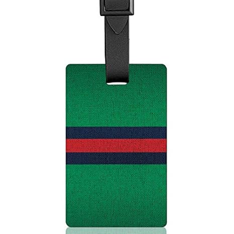 green luggage tags