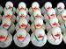 Two Dozen (24) Mini Glow-in-the-Dark Award Rubber Ducks