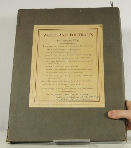 Cover Art for the book Woodland Portraits. A dark green cover with a pasted-on title sheet. No pictorial design.