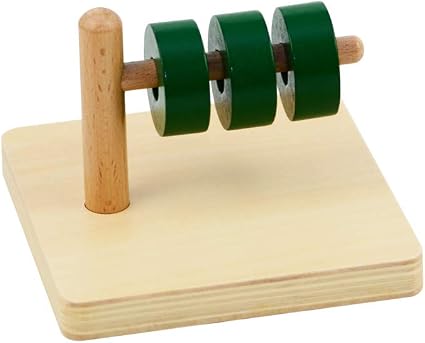 montessori discs on horizontal dowel