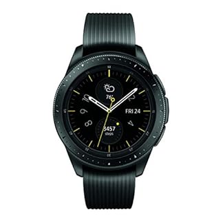 A Samsung Galaxy Smartwatch (42mm, Midnight Black) with a black silicone strap, featuring a 1.2-inch Super AMOLED digital display. The watch face shows the time, date (Fri 24), weather (76°F), and step count (5457 steps). The rotating bezel and two side buttons are visible, highlighting its sleek, minimalist design against a white background.