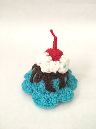 Blue ice cream scoop with chocolate sauce, sprinkle beads, whipped cream and a cherry on top hair clip barrette