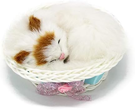 sleeping cat in basket toy