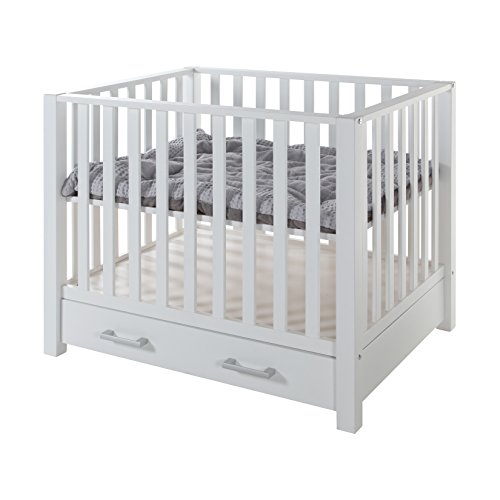 white wooden playpen