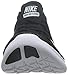 Nike Women's Free Running Motion Flyknit Shoes, Black/White - 9.5 B(M) US