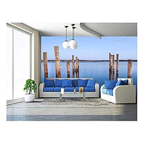 Mooring Posts Leading in Turquoise Blue Sea Aland Island Finland - Removable Wall Mural | Self-Adhesive Large Wallpaper - 66x96 inches