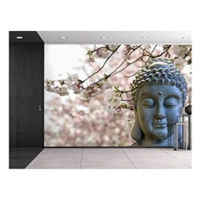 Buddha Statue on a Cherry Blossom Garden Wall Mural
