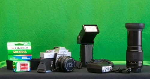 Minolta srT101 with tele, strobe, flash, hand mount, 50 mm lense