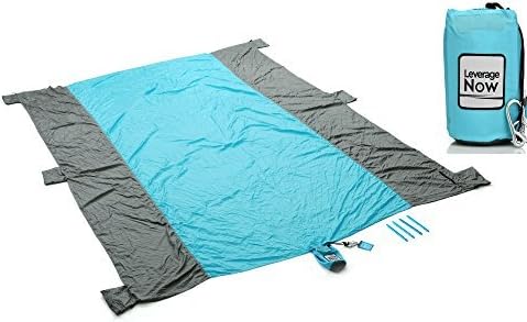 Beach Blanket - Sand Proof 10 Feet X 7.5 Feet - Perfect for Picnics, Camping, Outdoors, Kids Play Mat, Includes Zippered Pocket, Compact Storage Bag, 6 Sand Pockets, Nylon Parasheet,