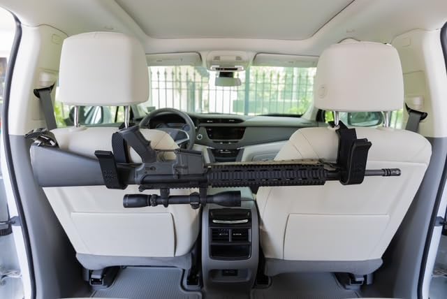 Photo 1 of Clip on Truck seat Firearm Rack by CoJo. for Rifles & Shotguns, Back of seat Holder, Truck seat Rack, ATV Gun Racks, Gun Racks for Trucks