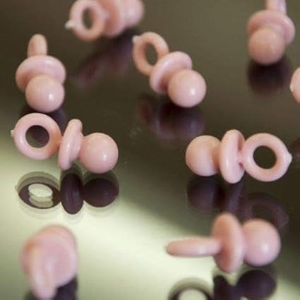 pink plastic pacifiers for baby shower