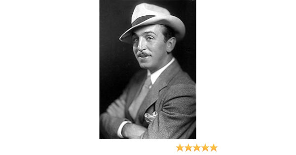 A Walt Disney wearing a fedora with his 