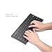 Airfox K20 Ultra Compact Slim Profile LED Backlit Wireless Bluetooth Keyboard for iOS, Android, Windows and Mac with Rechargeable Lithium Battery (Black)
