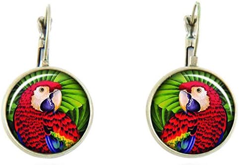 Round earrings with glass cabochons protecting a design with a parrot