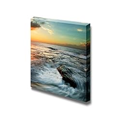 Swirling Waves at Sunset at The Tip of...