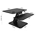 SLYPNOS Height Adjustable Standing Desk Converter Sit to Stand up Desk Riser, with Keyboard Mouse Deck and Cup Holder, 25 Inches Wide Ergonomic Workstation