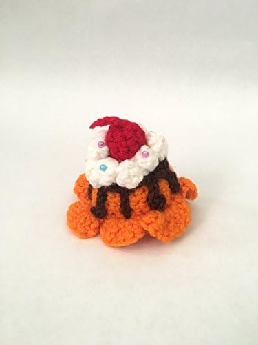 Orange ice cream scoop with chocolate sauce, sprinkle beads, whipped cream and a cherry on top hair clip barrette