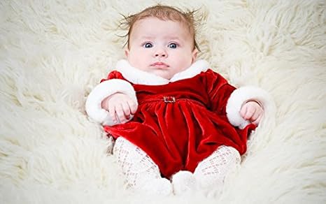baby in red dress