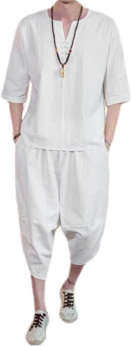 A man wearing a white cotton linen shirt and capri pants