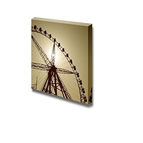 Silhouette of a Ferris Wheel at Sunset