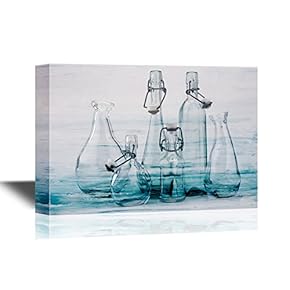 Empty Glass Bottles on Vintage Abstract Blue Textured Background