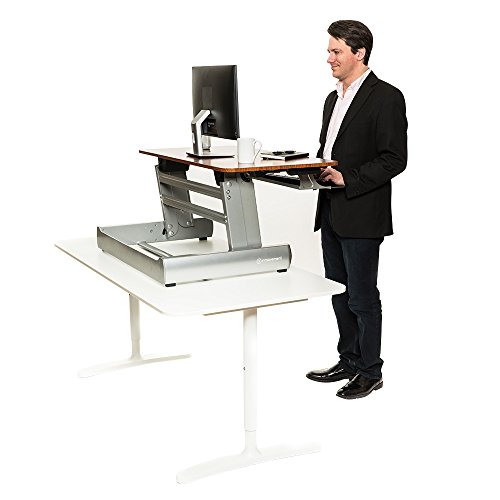 InMovement Standing Desk, Adjustable Heights for Sitting or Standing
While You Work, Light Wood, 41 X 26