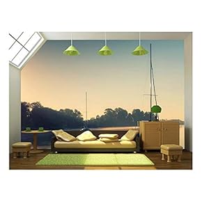 Little Sailing Boats Reflect in The Serene Water During Sunrise. - Removable Wall Mural | Self-Adhesive Large Wallpaper - 66x96 inches