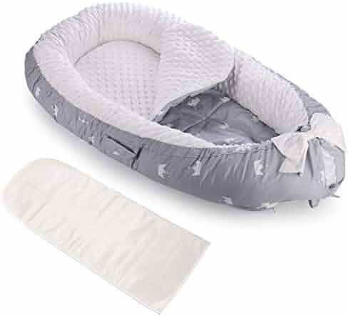snuggle nest baby lounger