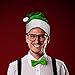 Windy City Novelties - Green Plush Christmas Santa Hat | St. Patrick’s Day Party Supplies Santa Costume Accessories Funny Hats for Men and Women.