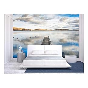 Old Pier on The Lake, a Floating Flock of Ducks and The Sky Reflecting in The Water - Removable Wall Mural | Self-Adhesive Large Wallpaper - 66x96 inches