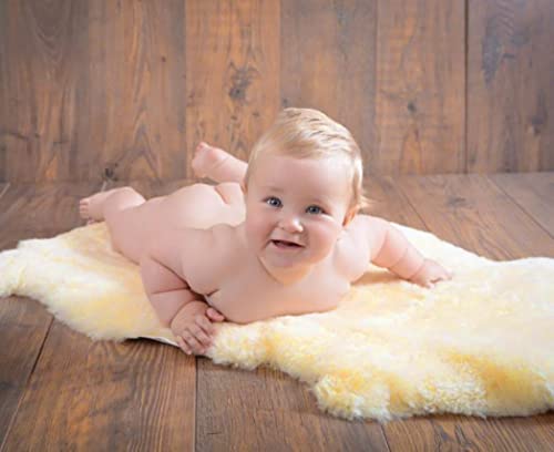 Photo 1 of HUAHOO Premium Baby Sheepskin Rug Babycare Nursery Rug 100% Natural Lambskin Blanket Short-Shorn Wool Sleep Pad Medical Sheepskin Hospital Bed Mattress Topper (Beige, Single Pelt 2.5ft x 3.5ft)