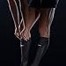 Storelli BodyShield Leg Guards, Premium Compression Shin Guard Sleeves for Soccer Players, Impact Protection, UV-Resistant, Sweat-Wicking, Unisex, 1 Pair, Black, Youth Small