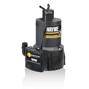 How do you use a pump to remove water from a basement?