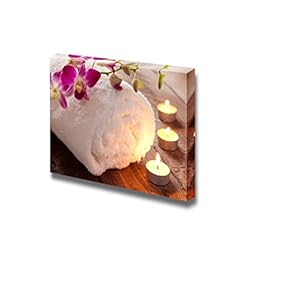 Spa Concept with Candle and Towel Wall Decor